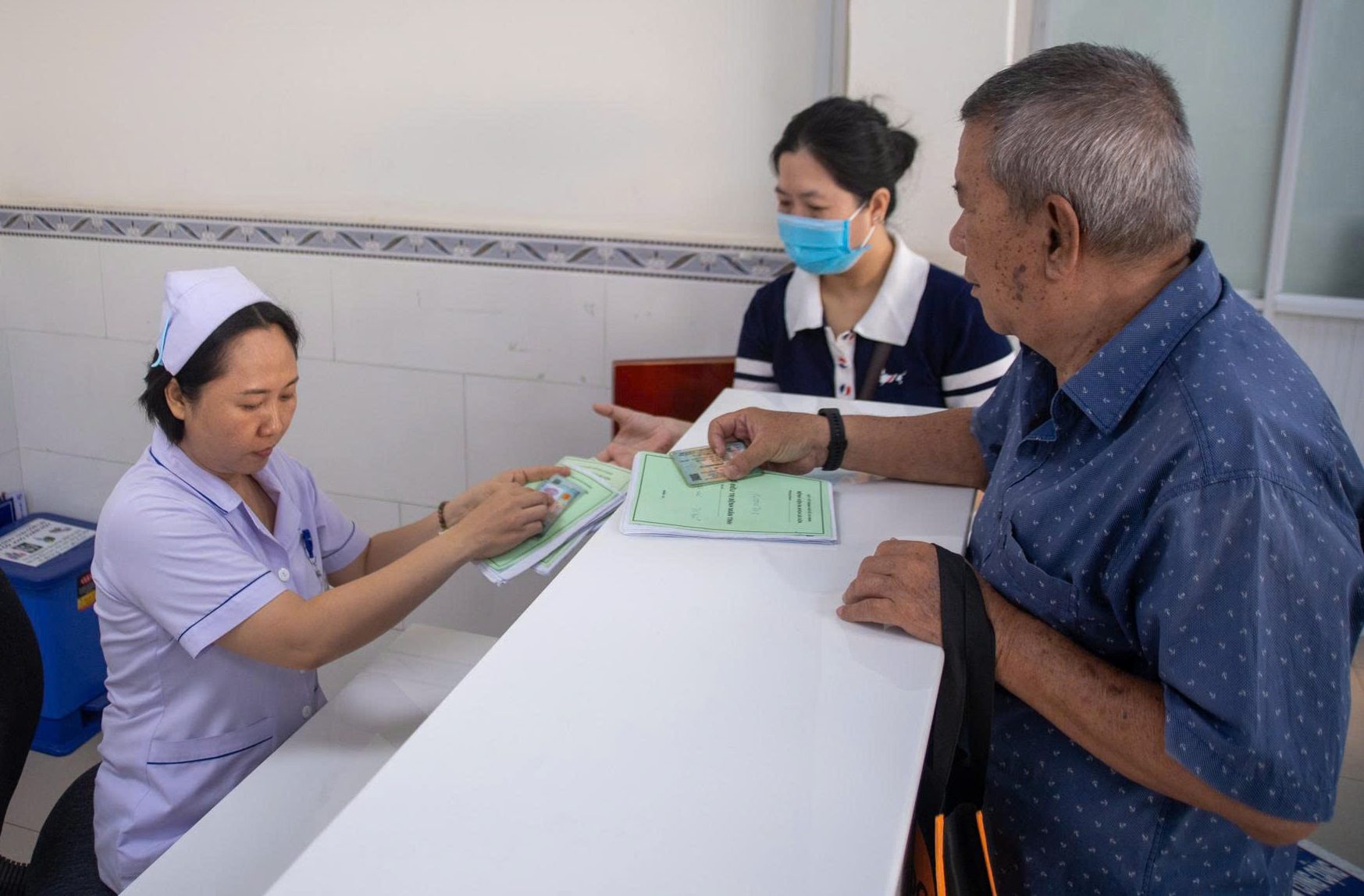 Bảo đảm quyền lợi BHYT sau sắp xếp - Ảnh 1.