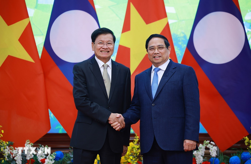 Thủ tướng Phạm Minh Ch&iacute;nh hội kiến Tổng B&iacute; thư, Chủ tịch nước L&agrave;o - Ảnh 1.