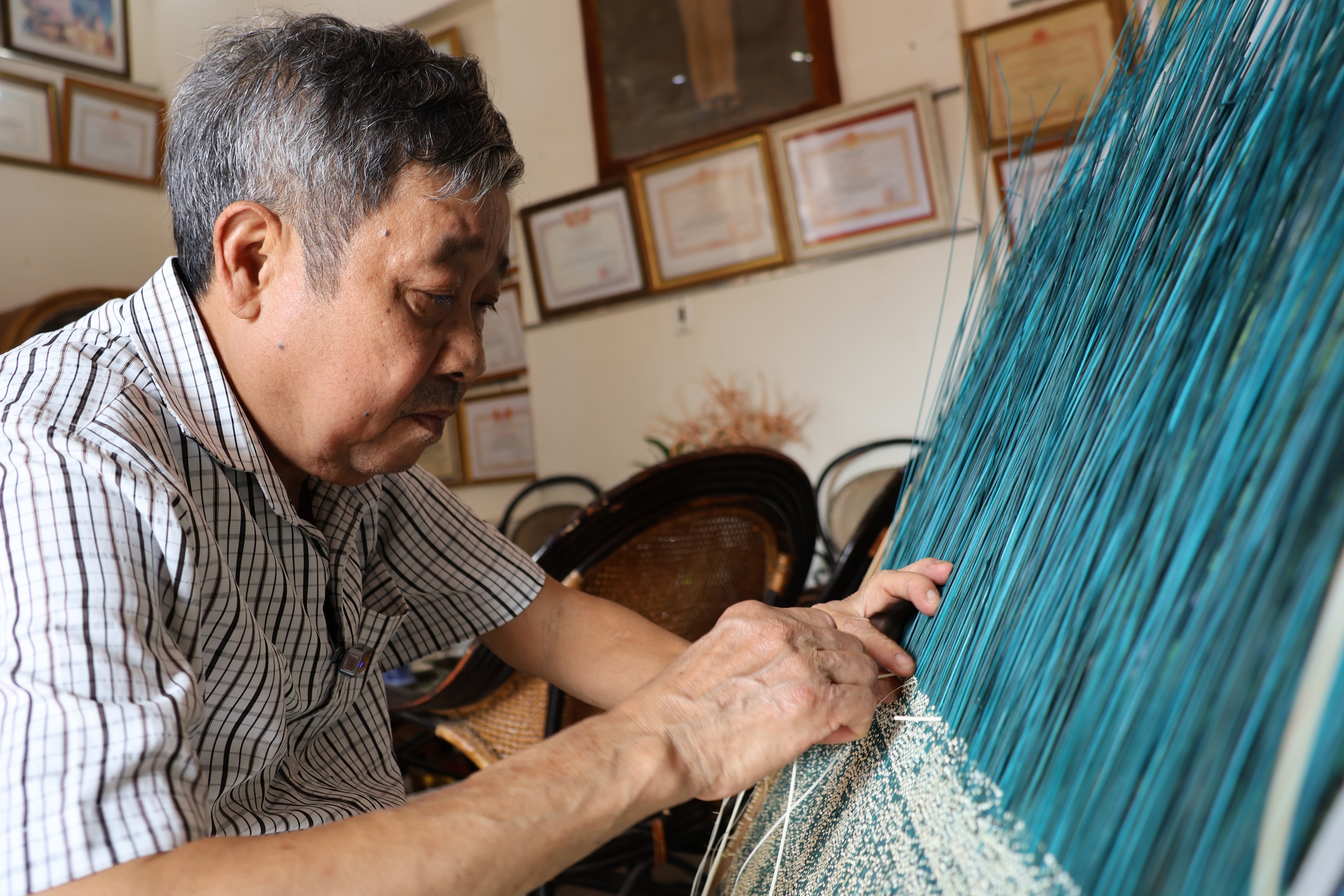 Nghệ nh&acirc;n nh&acirc;n d&acirc;n Nguyễn Văn Trung: Người tạo ch&acirc;n dung B&aacute;c Hồ bằng m&acirc;y tre đan - Ảnh 1.