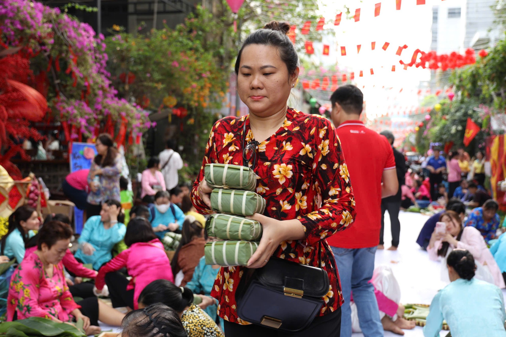 Rộn r&agrave;ng hội thi g&oacute;i b&aacute;nh chưng lan tỏa nghĩa t&igrave;nh Xu&acirc;n B&iacute;nh Ngọ - Ảnh 6.