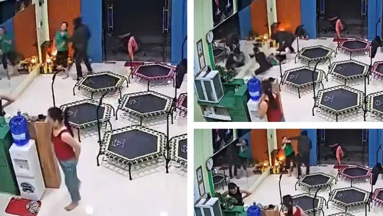 VIDEO: Người đàn ông bịt mặt xông vào phòng tập thể dục cướp dây chuyền - Ảnh 1.