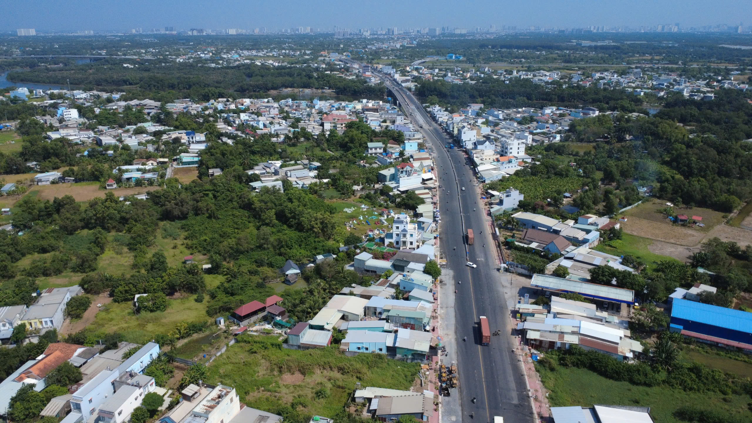 Th&ocirc;ng xe tạm cầu &Ocirc;ng Th&igrave;n th&uacute;c đẩy mở rộng Quốc lộ 50 năm 2026 - Ảnh 7.