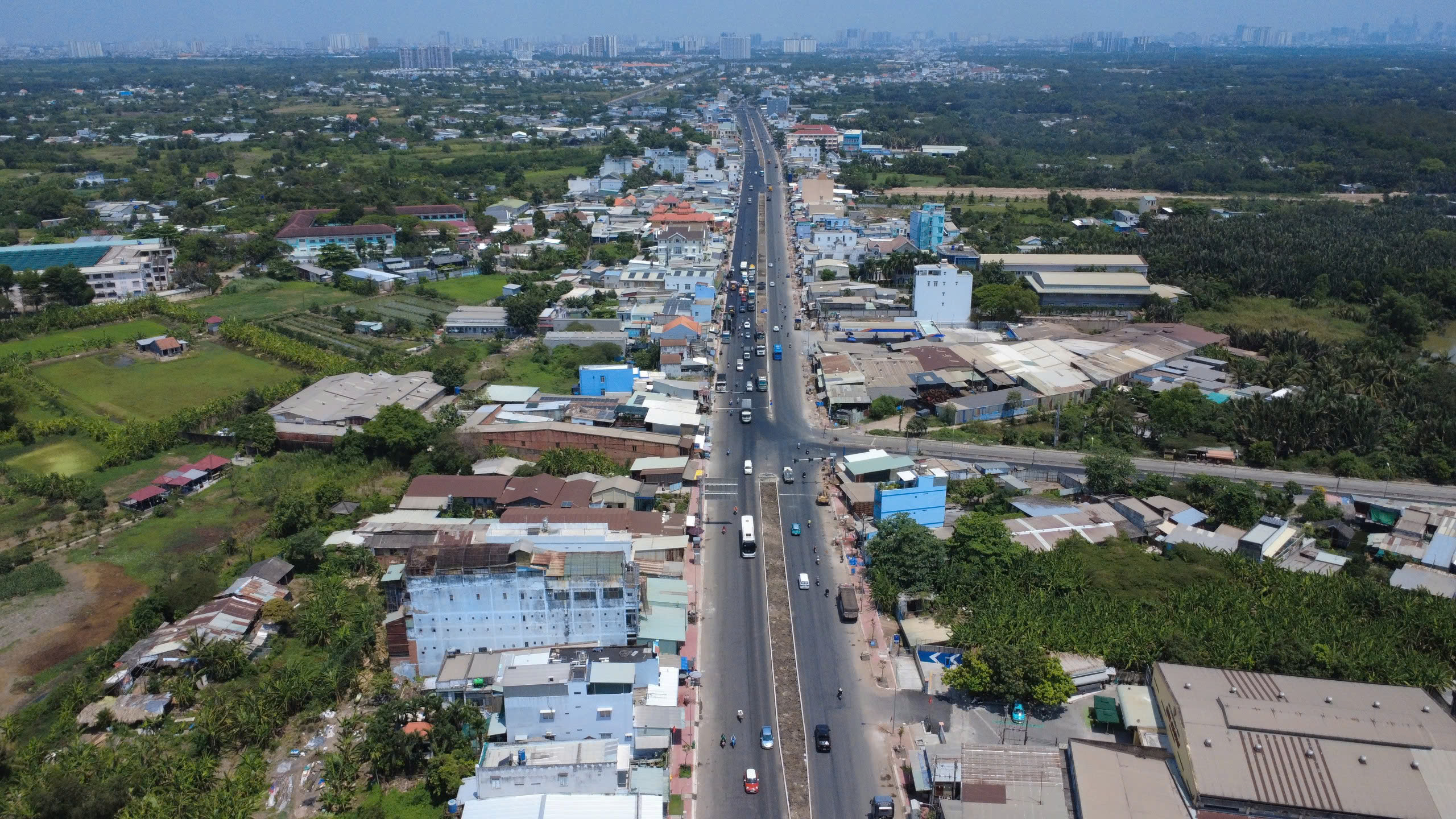 Th&ocirc;ng xe tạm cầu &Ocirc;ng Th&igrave;n th&uacute;c đẩy mở rộng Quốc lộ 50 năm 2026 - Ảnh 12.