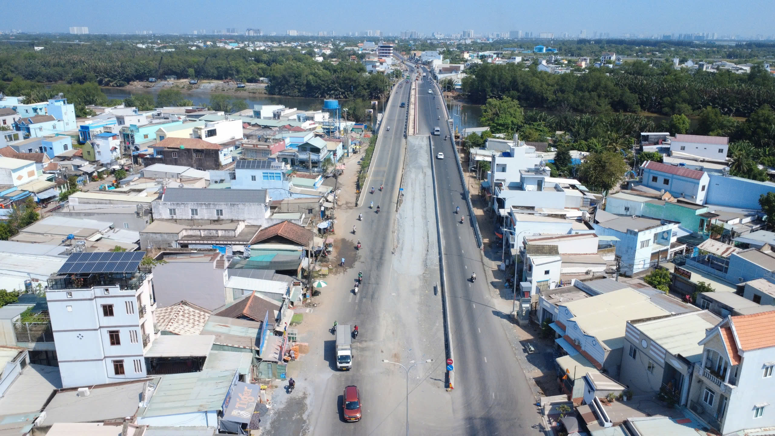 Th&ocirc;ng xe tạm cầu &Ocirc;ng Th&igrave;n th&uacute;c đẩy mở rộng Quốc lộ 50 năm 2026 - Ảnh 10.