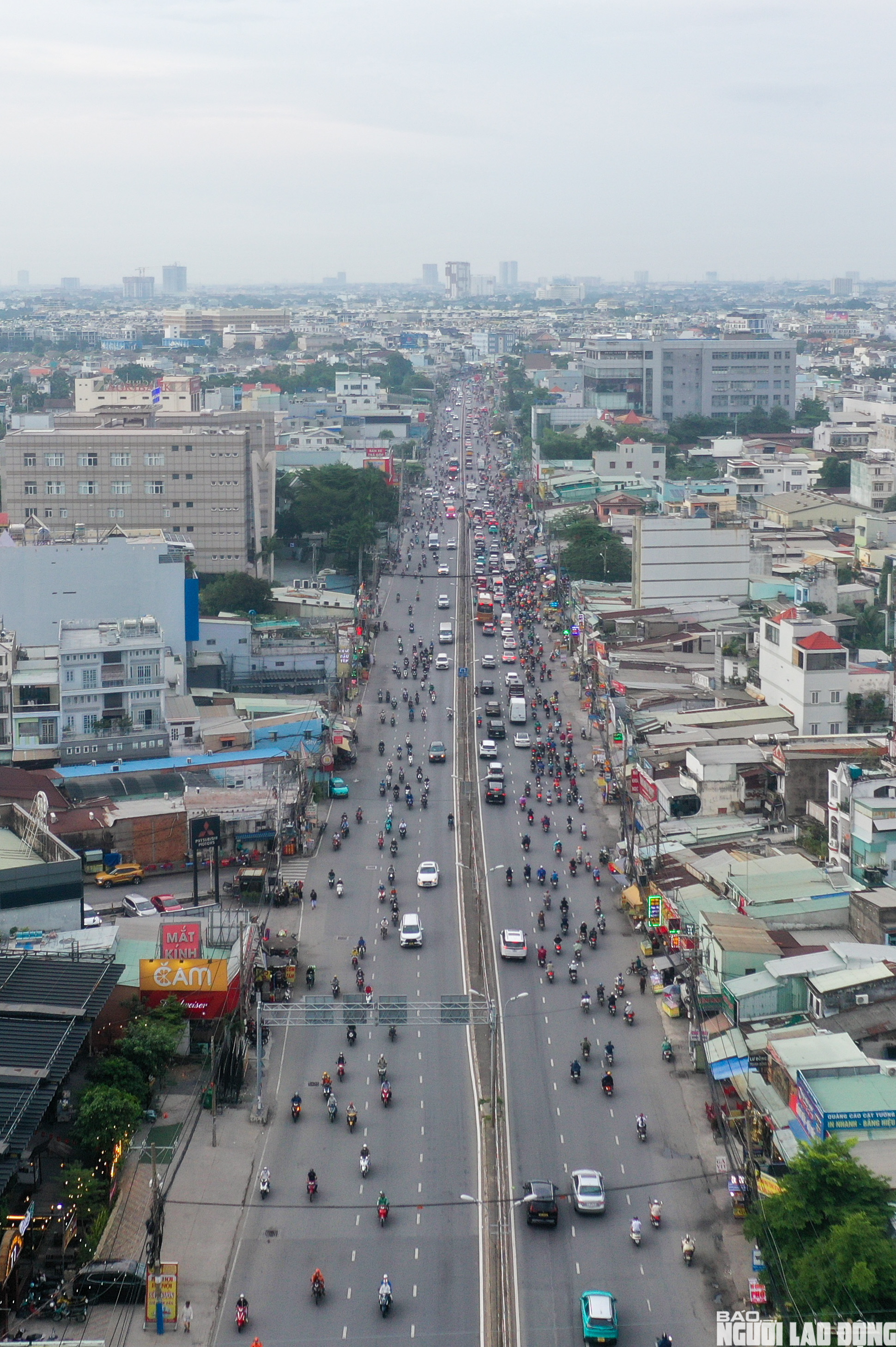 H&agrave;ng loạt nh&agrave; d&acirc;n dọc quốc lộ 13 th&aacute;o dỡ, mở rộng tuyến đi B&igrave;nh Dương - Ảnh 4.