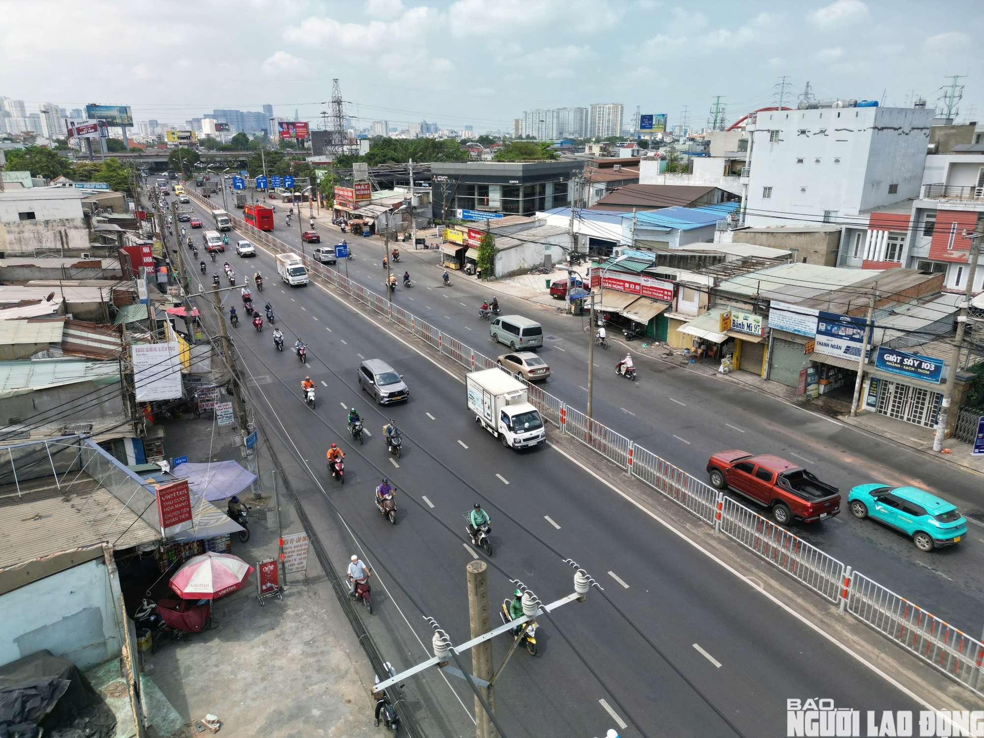 H&agrave;ng loạt nh&agrave; d&acirc;n dọc quốc lộ 13 th&aacute;o dỡ, mở rộng tuyến đi B&igrave;nh Dương - Ảnh 8.