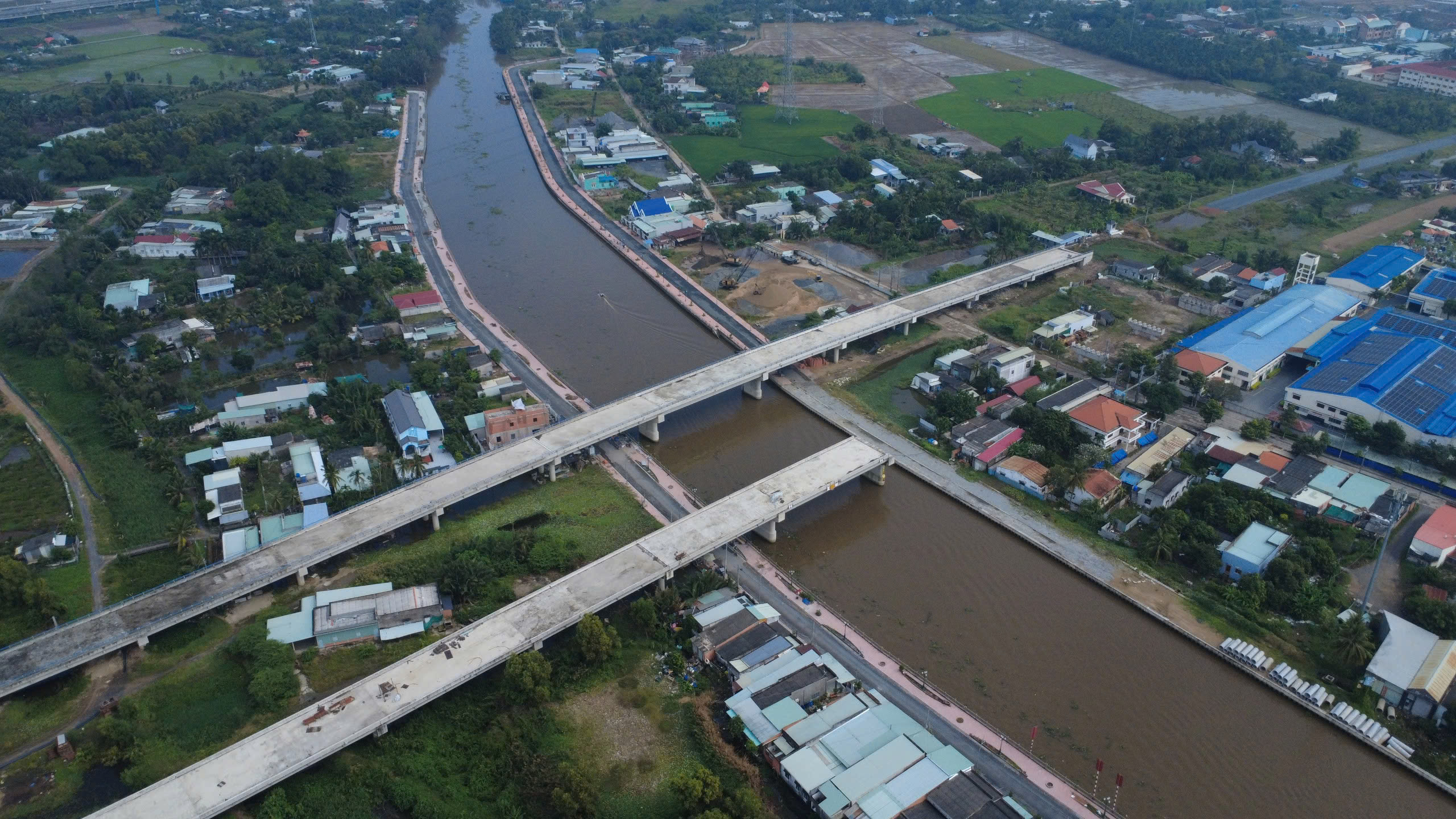 Dự án đường ĐT830E 2026 vẫn vướng mặt bằng hơn 50 hộ chưa di dời - Ảnh 1.