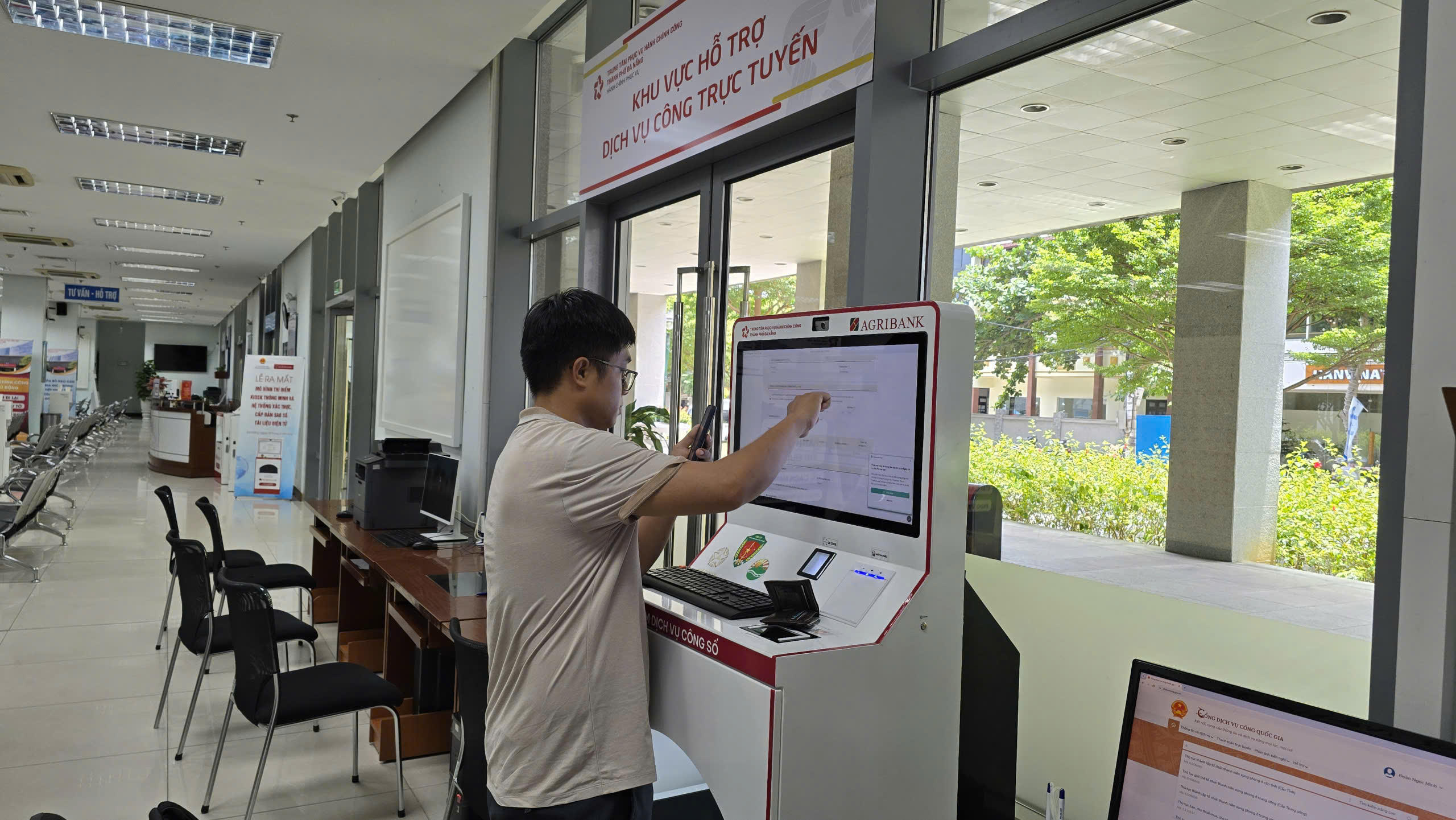 Đà Nẵng ra mắt 11 Trạm dịch vụ công số ứng dụng AI - Ảnh 3.