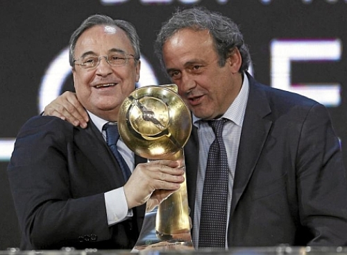 Chủ tịch UEFA Michel Platini (phải) trong một sự kiện của bóng đá châu Âu