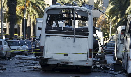 Chiếc xe buýt bị đánh bom hôm 24-11. Ảnh: Reuters
