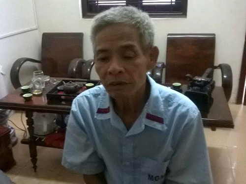 
Nghi can giết người Đỗ Văn Năm sau khi bị bắt giữ - Ảnh: Dân Việt
