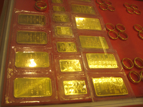 Giá vàng thế giới hiện tăng nhẹ lên 1.120 USD/ounce