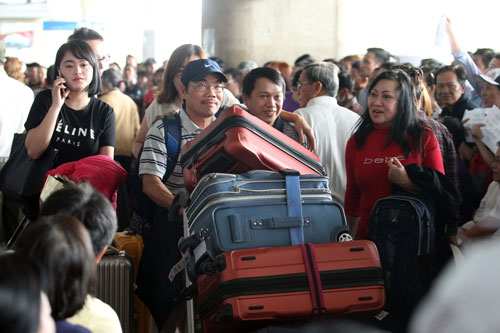 Sân bay Tân Sơn Nhất thường bị quá tải Ảnh: Hoàng Triều