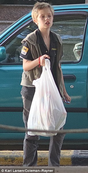 Angelina Jolie buys food and clothes