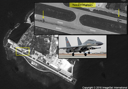 Hai máy bay chiến đấu Shenyang J-11 của Trung Quốc (mũi tên vàng) trên đảo Phú Lâm. Ảnh: ImageSat International