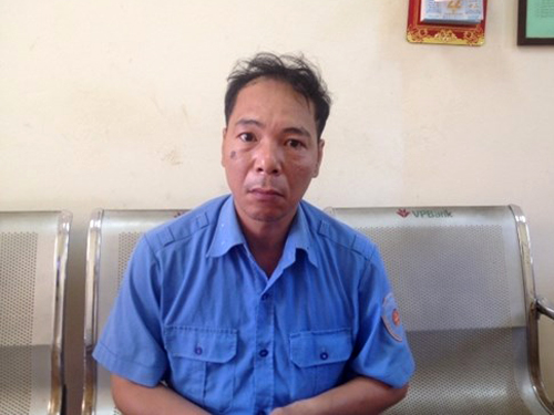 Nguyễn Quang Điệp, nghi phạm nhắn tin bỉ ổi tống tình người mẹ có con mất tích, tại cơ quan công an - Ảnh cơ quan công an cung cấp