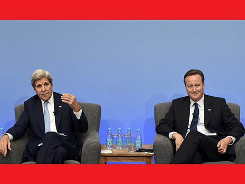 Thủ tướng Anh David Cameron (phải) và Ngoại trưởng Mỹ John Kerry tại Hội nghị Thượng đỉnh quốc tế về chống tham nhũng ở London ngày 12-5Ảnh: Reuters