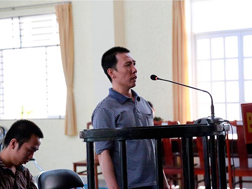 Trương Đức Tín trước vành móng ngựa tại phiên tòa xét xử sơ thẩm ngày 2-3