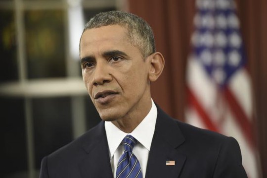 Tổng thống Obama phát biểu tại Phòng Bầu Dục ở Nhà Trắng hôm 6-12. Ảnh: Reuters