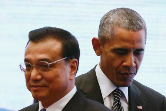 Tổng thống Mỹ Barack Obama (phải) và Thủ tướng Trung Quốc Lý Khắc Cường tại Malaysia ngày 22-11. Ảnh: Reuters