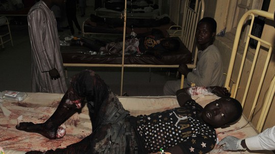 Nạn nhân trong vụ đánh bom tại TP Kano. Ảnh: AP