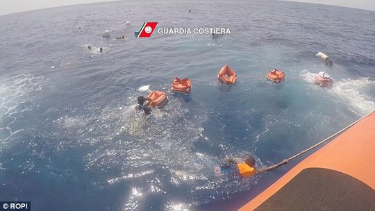 Saving grace: Just moments after being brought onto the coast guard ship, the woman went into labour