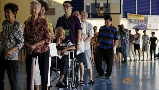 http://www.channelnewsasia.com/image/2119130/1441933236000/large16x9/768/432/voters-queue-to-cast.jpg