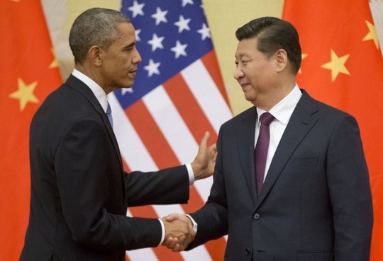 
Tổng thống Mỹ Barack Obama (trái) và Chủ tịch Trung Quốc Tập Cận Bình

trong lần gặp nhau ở Bắc Kinh hồi tháng 11-2014Ảnh: AP
