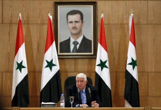 
Ngoại trưởng Syria Walid al-Moualem phát biểu tại cuộc họp báo được truyền hình tại thủ đô Damascus hôm 12-3. Ảnh: Reuters
