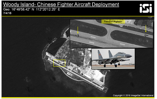 Hai chiến đấu cơ Shenyang J-11 của Trung Quốc (mũi tên vàng) trên đảo Phú Lâm. Ảnh: ImageSat International