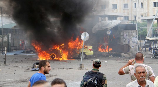 Hiện trường một vụ nổ ở TP Tartus hôm 23-5. Ảnh: SANA