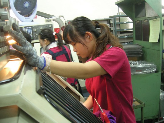 Lao động nữ Việt Nam làm việc tại một nhà máy ở Đài Loan. (Ảnh chỉ có tính minh họa) Ảnh: DUY QUỐC
