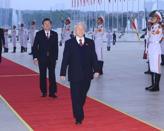 Tổng Bí thư Nguyễn Phú Trọng và Chủ tịch nước Trương Tấn Sang đến Trung tâm Hội nghị Quốc gia Mỹ Đình - Ảnh: TTXVN