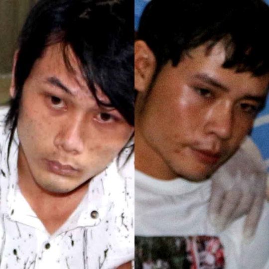 
Hai đối tượng Nguyễn Trường Giang (bìa trái) và Lê Vũ Kha tại cơ quan điều tra.
