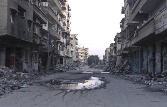 Khung cảnh tang hoang tại Deir al-Zor vào tháng 3-2015. Ảnh: Reuters