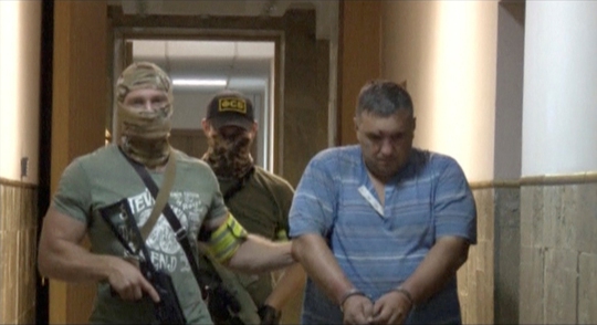 Ảnh chụp từ đoạn video về một nghi phạm lên kế hoạch tấn công ở Crimea được FSB công bố hôm 11-8 Ảnh: Reuters