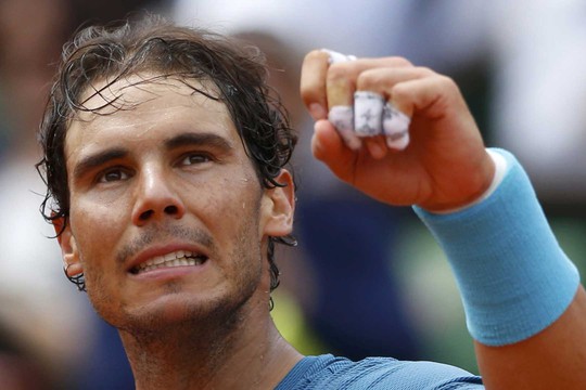 Nadal chỉ gặp khó khan ở ván đầu sau 2 trận toàn thắng 3-0 Ảnh: REUTERS