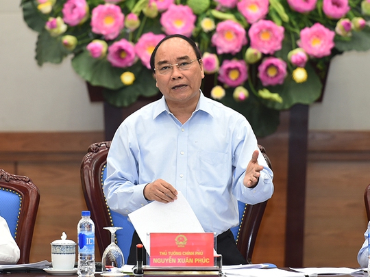 Thủ tướng Nguyễn Xuân Phúc yêu cầu Bộ Công an thu thập tài liệu chứng cứ, nếu phát hiện có vi phạm pháp luật hình sự thì kiên quyết xử lý nghiêm vụ cá chết hàng loạt - Ảnh: VGP