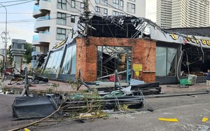 Người dân ngao ngán nhìn hàng trăm chiếc tàu sếp chồng lên nhau sau bão số 13 - Ảnh 13.