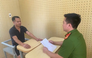 Vợ bị yêu cầu dừng xe kiểm tra, chồng lăng mạ, tát CSGT - Ảnh 1.