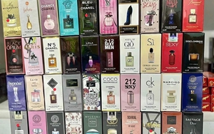 QLTT TP HCM phát hiện hàng ngàn sản phẩm nước hoa, mỹ phẩm, thực phẩm chức năng nghi giả mạo - Ảnh 3.