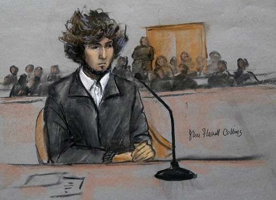 In this courtroom sketch, Boston Marathon bombing suspect Dzhokhar Tsarnaev is depicted sitting in federal court in Boston Thursday, Dec. 18, 2014...