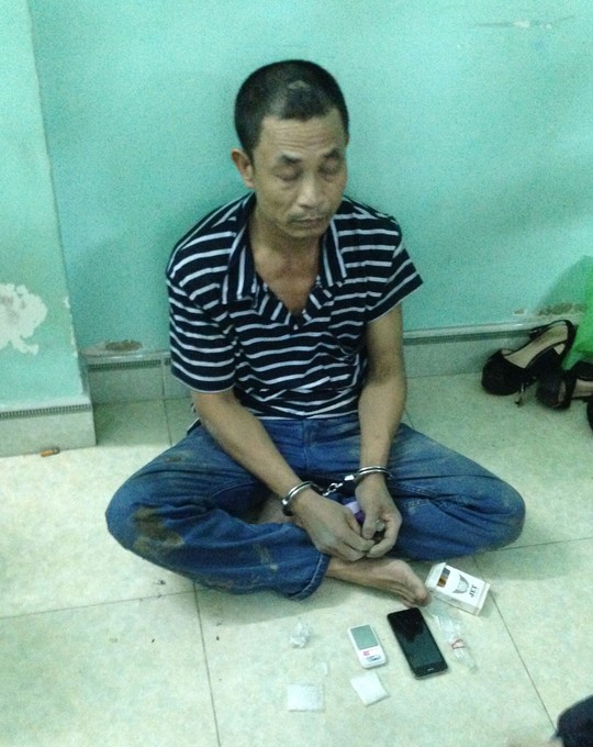 Bùi Quang Tùng tại cơ quan công an