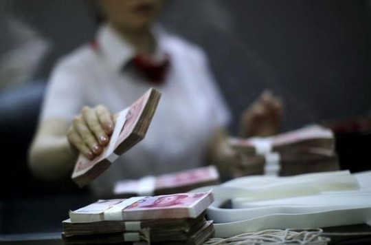 Đồng nhân dân tệ trượt giá ngày thứ 2 liên tiếp. Ảnh: Reuters