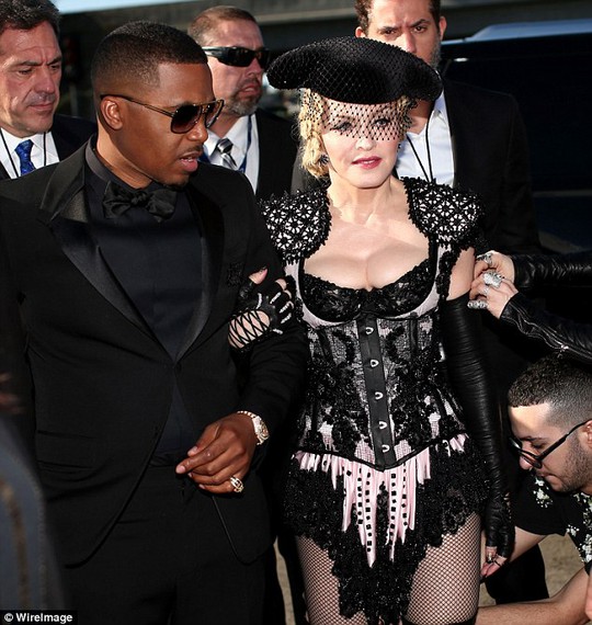 Date: Madonna arrived arm in arm with rapper Nas, who she has collaborated with on her new album 