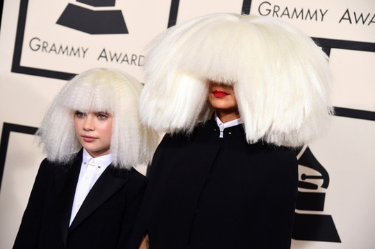 Sia, right, and Maddie Ziegler arrive at the 57th annual Grammy Awards.