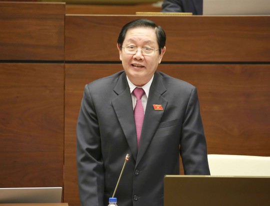 Bộ trưởng Bộ Nội vụ Lê Vĩnh Tân trả lời chất vấn về vấn đề bổ nhiệm cán bộ tại cuộc họp Quốc hội vào chiều 16-11 Ảnh: TTXVN