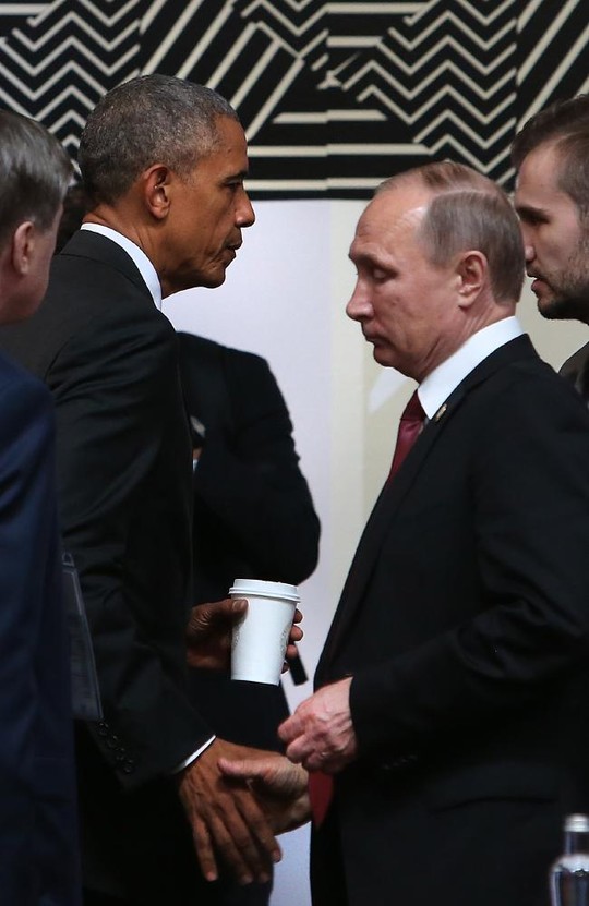 Hai ông Obama và Putin hầu như không nhìn mặt nhau khi bắt tay. Ảnh: NEWS CORP AUSTRALIA