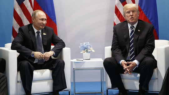Cuộc gặp chưa từng tiết lộ giữa hai ông Donald Trump và Putin - Ảnh 2.