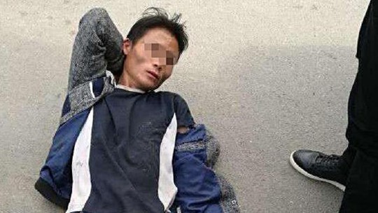 Trung Quốc: Tử hình kẻ giết cha mẹ và 17 người vì tiền - Ảnh 1.